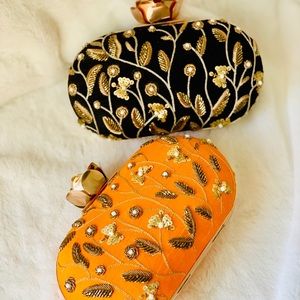 Hand embroidered clutches